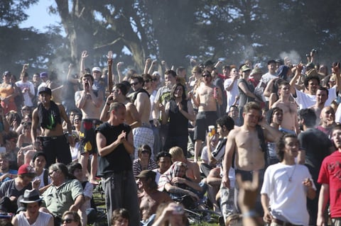 FILE - In this April 20, 2009 file photo, a large crowd cheers as the time reaches 4:20 p.m. on Hippie Hill in Golden Gate Park in San Francisco.