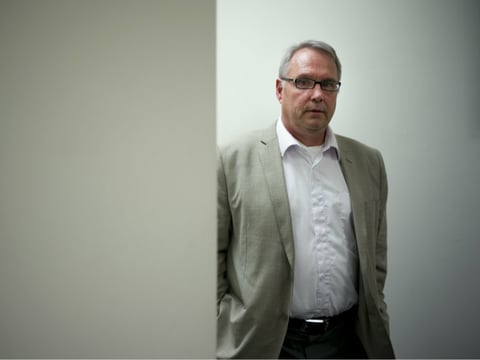Attorney William Johnson, a leader of the American Freedom Party and self-proclaimed white nationalist, pauses for photos in his office, Tuesday, May 10, 2016, in Los Angeles. 