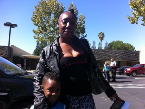 Jackeyshia Freshwater and her son at the Arden Way Social Security office on Tuesday.