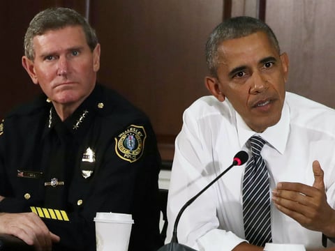 President Obama speaks as Terry Cunningham of the International Association of Chiefs of Police listens July 13 during a conversation on community policing and criminal justice at the Eisenhower Executive Office Building in Washington.