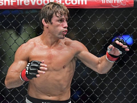 Urijah Faber in action against Jimmy Rivera during a bantamweight bout at UFC 203 on Saturday, Sept. 10, 2016, in Cleveland. Jimmy Rivera won via decision. 

