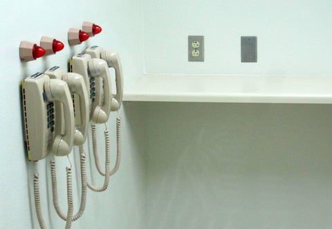 Phones line the wall of the lethal injection chamber at San Quentin State Prison when it was unveiled to reporters in 2010. The facility has never been used.