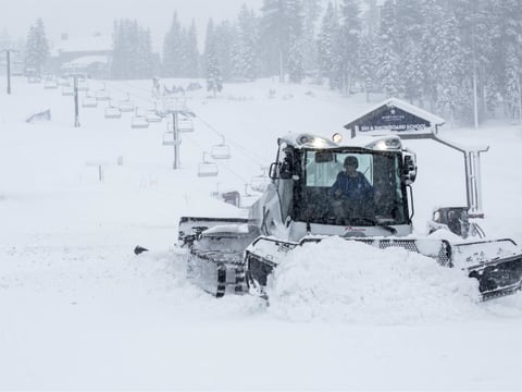 In this photo provided by Northstar California, groomers prepare the Big Easy chairlift for guests to enjoy the 96 inches of new snow from the latest round of storms Thursday, Jan. 12, 2017, at the Northstar California resort in Truckee, Calif.