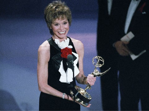 Mary Tyler Moore, 56, accepts the Emmy for best supporting actress in a miniseries or special for her role in “Stolen Babies” during the 45th annual Emmy Awards in Pasadena, California, Sunday, Sept. 19, 1993. 