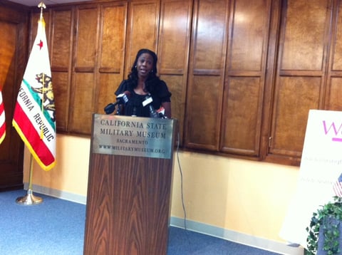 Oakland resident Patricia Brooks, a U.S. Navy veteran who's used the Joining Forces Mentoring Plus program at the national level, speaks at a Sacramento news conference on Veterans Day announcing the program's California launch.