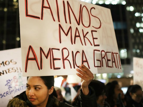 On the eve of a Day Without Immigrants, people attend a Valentine's Day rally organized by the New York Immigration Coalition called "Love Fights Back" in New York City.