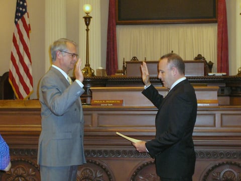 Calif. Sen. Bill Emmerson (R-Hemet), left, takes the oath of office in August 2010.