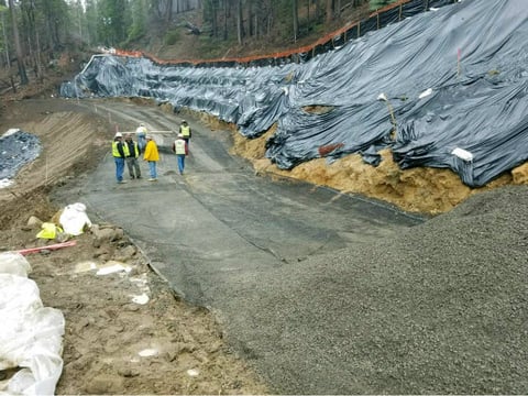 Workers repair the road to Yosemite National Park's Big Oak Flat entrance on April 18. 