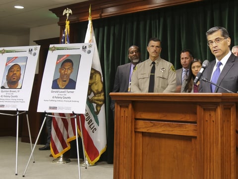 California Attorney General Xavier Becerra, far right, announces what authorities believe to be one of the largest human trafficking cases in the western United States dying a news conference in in Los Angeles Thursday, July 27, 2017.