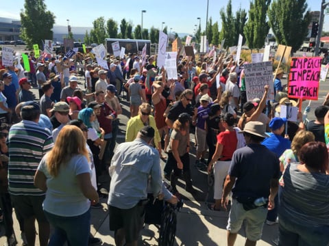 Protestors gather outside of the Reno-Sparks Convention Center before President's Trumps address to the American Legion’s national convention.