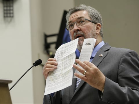 Assemblyman Ken Cooley, D-Rancho Cordova, displays state and legislative policies concerning sexual harassment during a committee hearing tasked with revising the California Assembly's sexual harassment policies, Tuesday, Nov. 28, 2017, in Sacramento