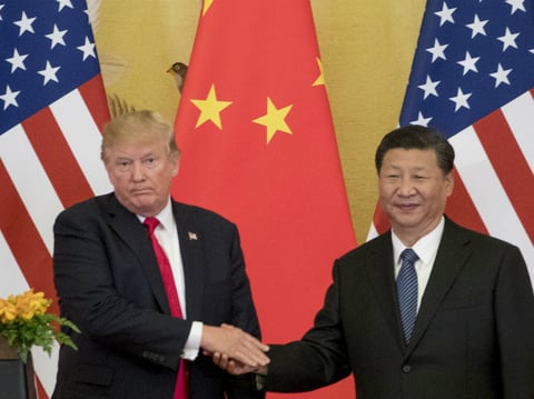President Donald Trump and Chinese President Xi Jinping shake hands during a joint statement to members of the media Great Hall of the People, Thursday, Nov. 9, 2017, in Beijing, China. 