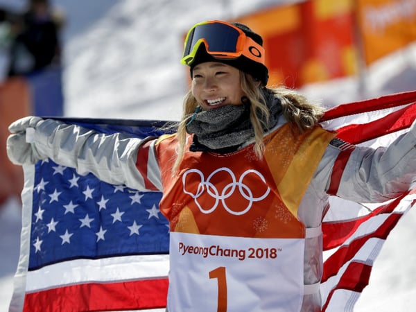 Chloe Kim, of the United States, celebrates winning gold after the women's halfpipe finals at Phoenix Snow Park at the 2018 Winter Olympics in Pyeongchang, South Korea, Tuesday, Feb. 13, 2018.
