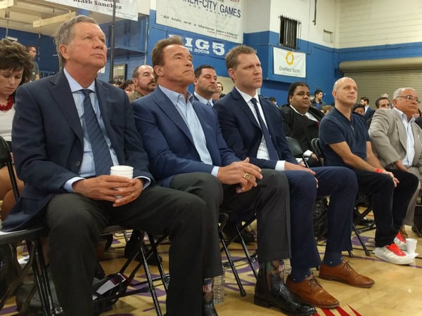From left: Ohio Governor John Kasich, former California Governor Arnold Schwarzenegger and Assemblyman Chad Mayes (R-Yucca Valley) sit at the beginning of the first New Way California event in Los Angeles.