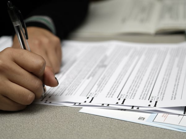 A voter casts a ballot at the Santa Clara County Registrar of Voters, Friday, Nov. 4, 2016, in San Jose , Calif. 