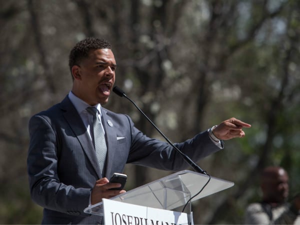 Rev. Shane Harris with the National Action Network speaks at a peace rally for Stephon Clark organized with former NBA player Matt Barnes.