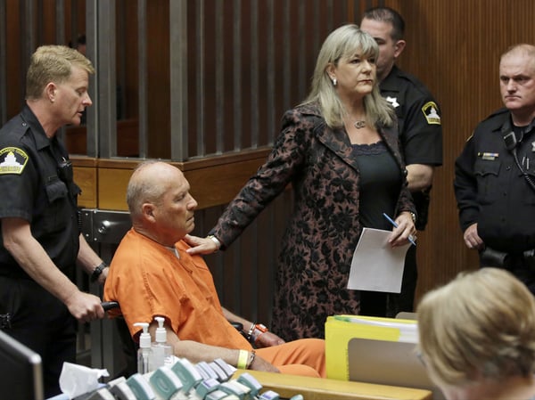 Joseph James DeAngelo, 72, who authorities suspect is the so-called Golden State Killer responsible for at least a dozen murders and 50 rapes in the 1970s and 80s, is wheeled out of the courtroom after his arraignment, Friday, April 27, 2018.