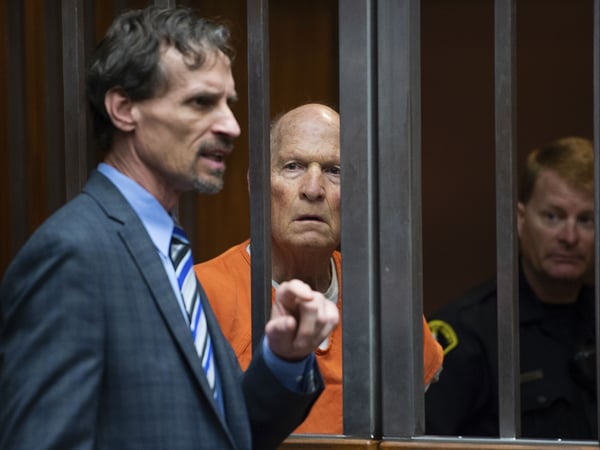 Joseph James DeAngelo, the former police officer accused of being the Golden State Killer, stands with his attorney Joe Cress in a Sacramento jail court on May 29, 2018. DeAngelo is suspected in at least 12 killings and roughly 50 rapes.