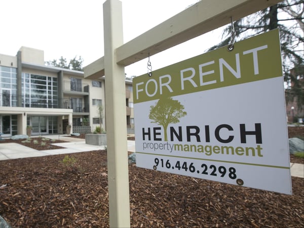 This photo shows a "For Rent" sign outside an apartment building in Sacramento, Calif.