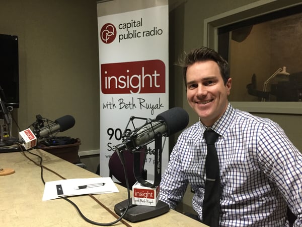 Reporter Allen Young in the Insight studio.
