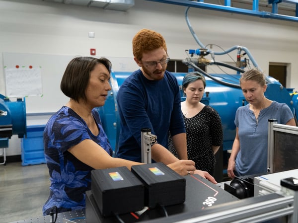 UC Davis Professor and MacArthur Fellowship recipient Sarah T. Stewart (left) at work