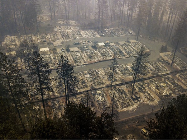 Residences leveled by the Camp Fire line a neighborhood in Paradise, Calif., on Thursday, Nov. 15, 2018.