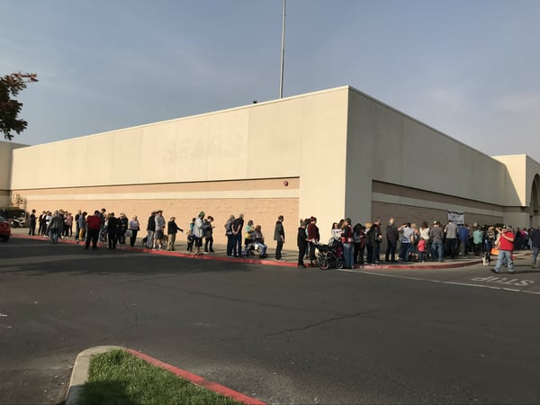 People line up to meet with FEMA representatives in Chico.