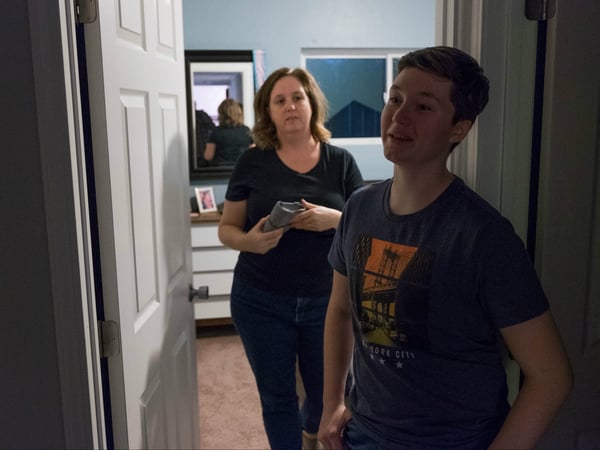Jeanne Alongi and her son, Michael, wind down from a day at work and school.
