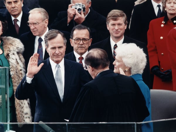 Former Chief Justice William Rehnquist administering the oath of office to former President George H. W. Bush during Inauguration ceremonies at the United States Capitol on January 20, 1989.