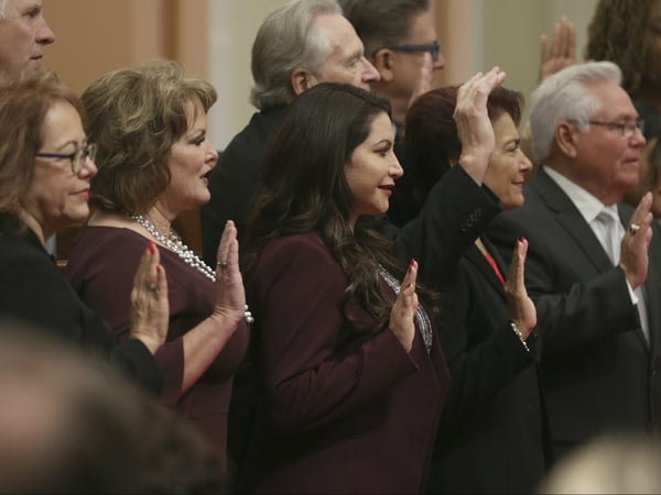 Members of the state Senate take the oath of office, Monday, Dec. 3, 2018, in Sacramento, Calif.