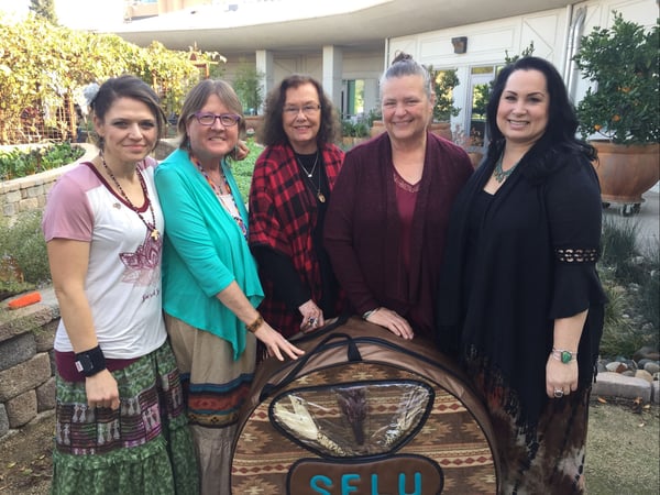 Native American women's drum group Otsigeya in the CapRadio garden