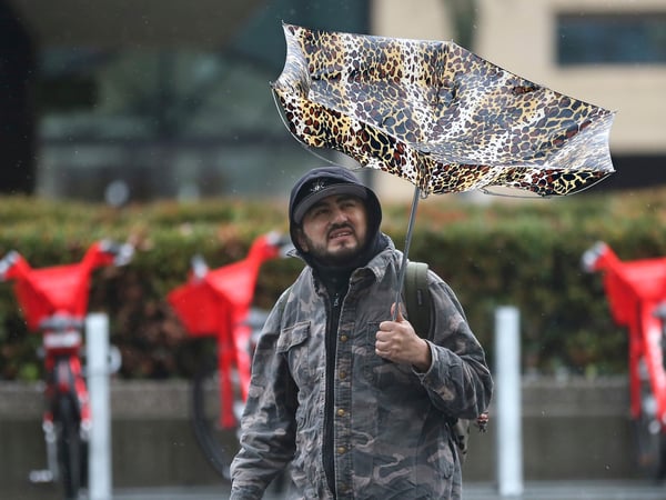 High winds caused havoc for a man using an umbrella as rain pelted Sacramento on Tuesday, Feb. 26, 2019.