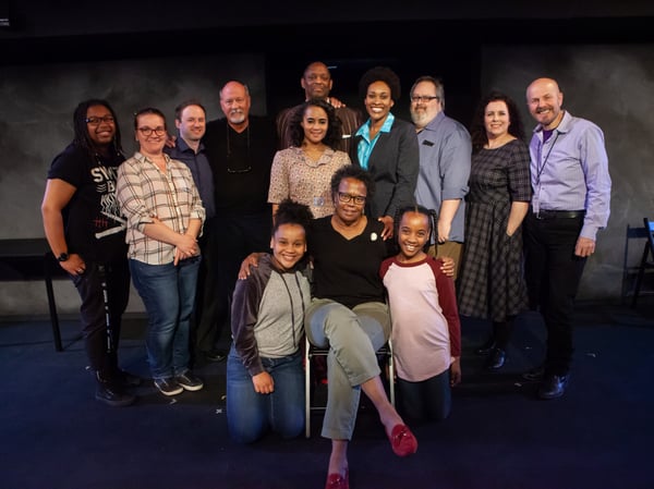 Writer Ginger Rutland, seated center, with the cast and creative team behind the Sacramento Theatre Company's production of "When We Were Colored".