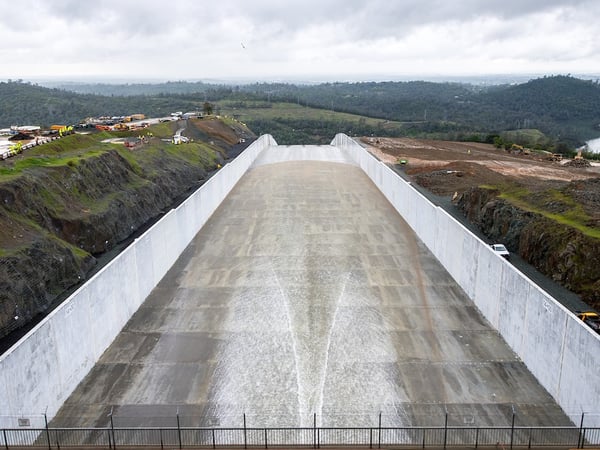 Water flows down the rebuilt Oroville Dam spillway for the first time in two years.
