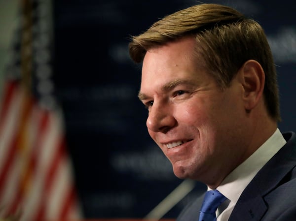 U.S. Rep. Eric Swalwell, D-Calif., smiles at a Politics & Eggs event, Monday, Feb. 25, 2019, in Manchester, N.H.