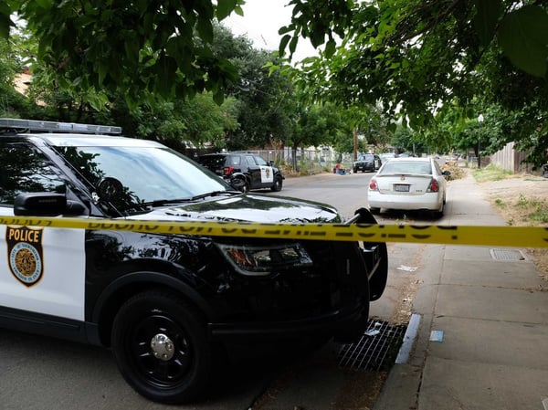Sacramento police officers continue to work the scene where Officer Tara O'Sullivan was shot on the evening of June 19, 2019.