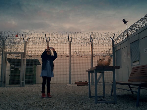 A still from the film "Midnight Traveler," about a family fleeing Afghanistan after a bounty is put on director and father Hassan Fazili’s head.