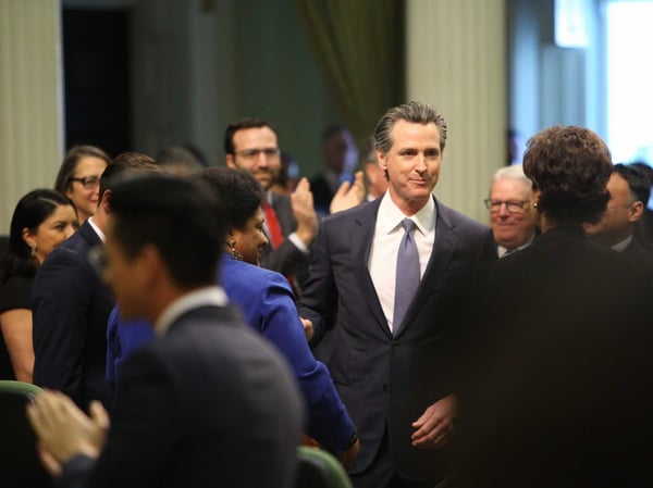 California Gov. Gavin. Newsom enters the chambers before his 2020 State of the State.