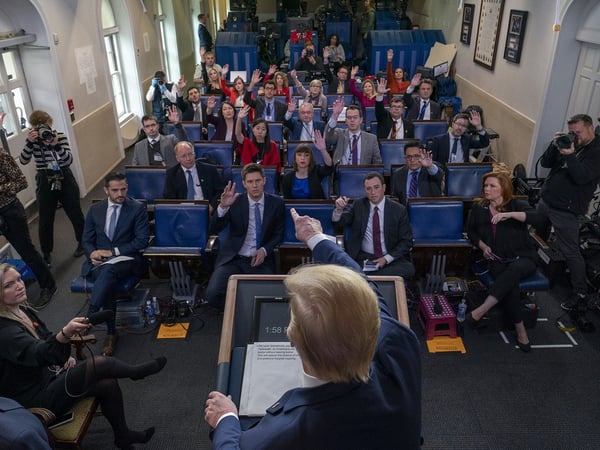 President Trump takes questions on the coronavirus during a briefing at the White House on Saturday, March 21.