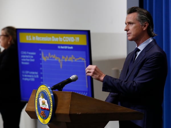 California Gov. Gavin Newsom discusses his revised 2020-2021 state budget during a news conference in Sacramento, Calif., Thursday, May 14, 2020.