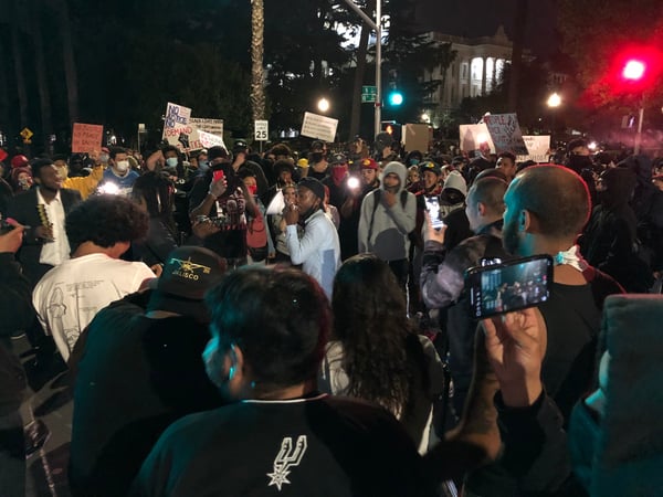 Stevante Clark leads a group of demonstrators near the California Capitol Sunday, May 31, 2020.