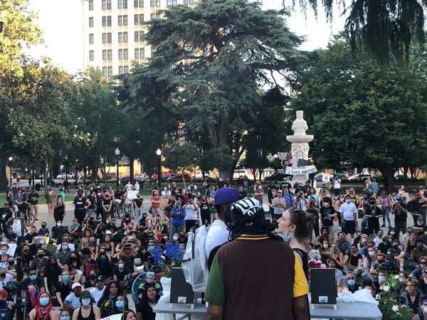 Demonstrators gather at Cesar Chavez Plaza Tuesday, June 2, 2020.