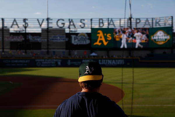 An attendee wears an A's baseball cap at the Las Vegas Ballpark for a baseball game between the Colorado Rockies and the Athletics, Friday, June 12, 2026, in Las Vegas.