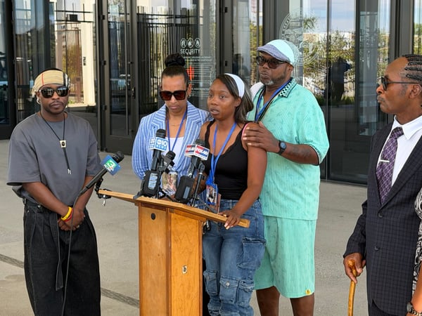 EMPACT founder Leia Schenk (second from left), Johntezha Alexander (center) and John Alexander (second from right), family members of 21-year-old victim Johntaya Alexander, speak after a mistrial was declared Tuesday, July 21, 2026 in Sacramento.