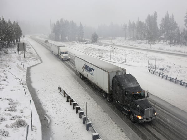 Vehicles make their way along eastbound Interstate 80 near Soda Springs, Calif. Thursday, Dec. 11, 2014. 
