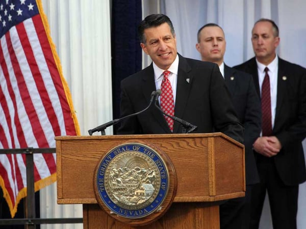Nevada Gov. Brian Sandoval speaks after his swearing in ceremony during his inaugural ceremony on the front steps of the capital in Carson City, Nev., Monday, Jan. 5, 2015.
