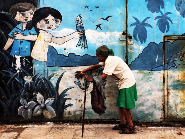 This photo was taken in one of the poorer neighborhoods of Havana. The guides called it "less favored" since the word "poor" is seen negatively in Cuban culture. People are not rich or poor, they are more or less favored.