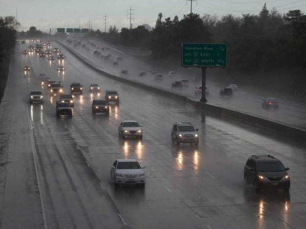 Traffic on Highway 50 continues in the afternoon rain on Sunday, Feb. 8, 2015