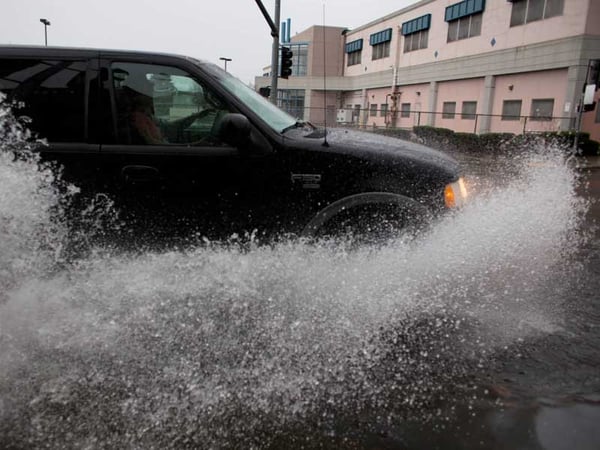 Cars face flooding on Stockton Boulevard Sunday afternoon, Feb. 8, 2015.