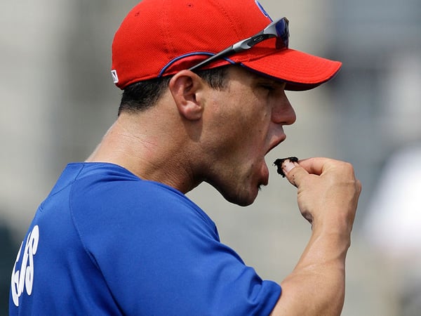 In this March 27, 2009 file photo, Philadelphia Phillies Marcus Giles taking a dip of smokeless tobacco before batting practice at a spring training baseball game against the Houston Astros, in Kissimmee, Fla. 
